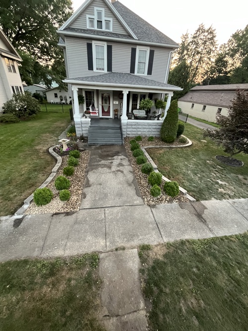 Manicured walkway and plantings at a home near Bolivar, Ohio