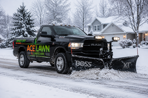 Ace Lawn & Landscape plow truck clearing snow
